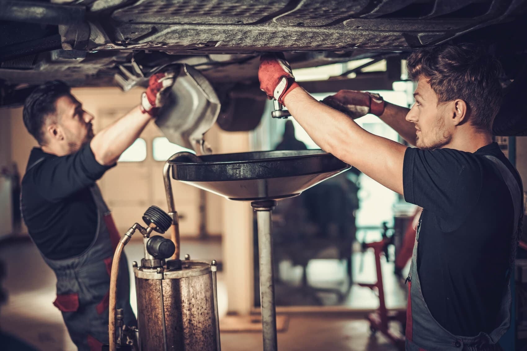 Ford Technicians inspecting brakes at Don's Ford Service Center.